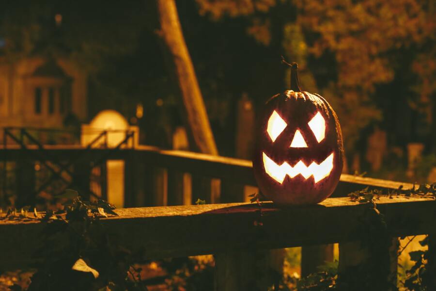 Candle Lit Pumpkin in Halloween Season